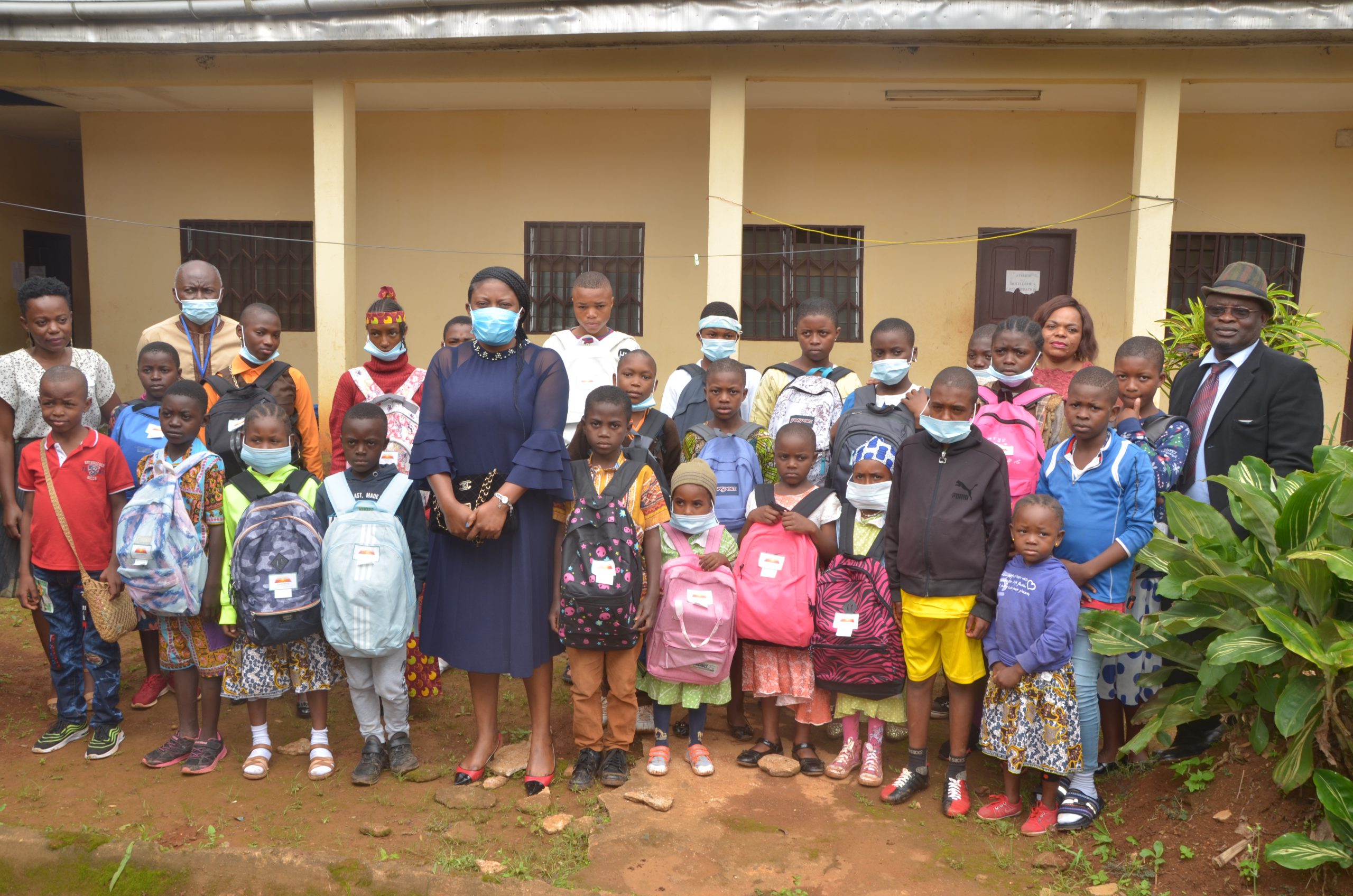 Internally Displaced Children as they receive School kits